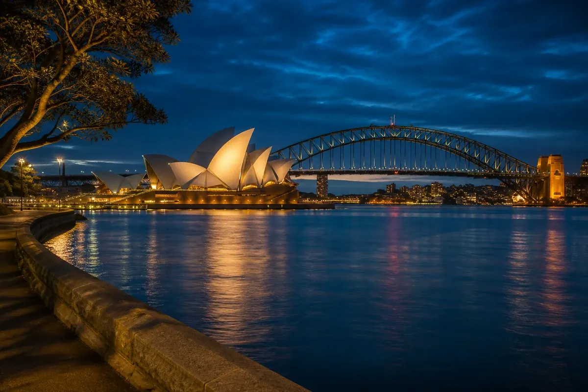 Sydney Opera House and Harbour Bridge illuminated at blue hour